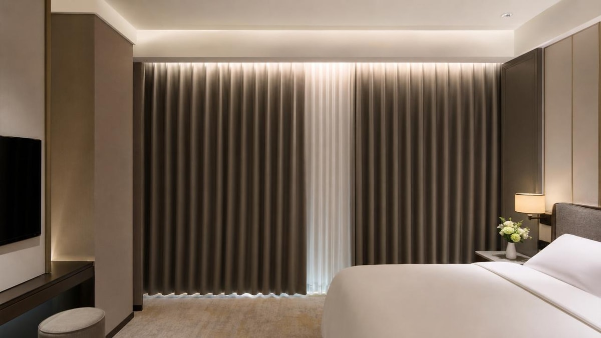 Blackout curtains for hotels that block light without trapping heat
